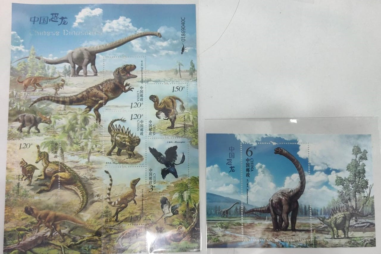 China Glow under UV light One sheetlet +1 Ms on dinosaur 🦕🦖 with die cut cancellation also in shape of dinosaur 🦕
