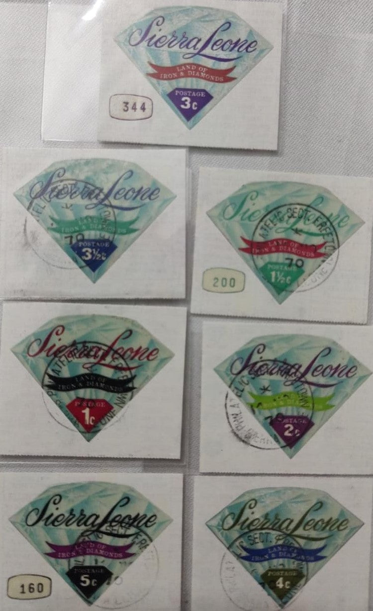 Sierra Leone 7 odd shaped -diamond shaped stamps 6 stamps with first day cancellation and 1 Mint.