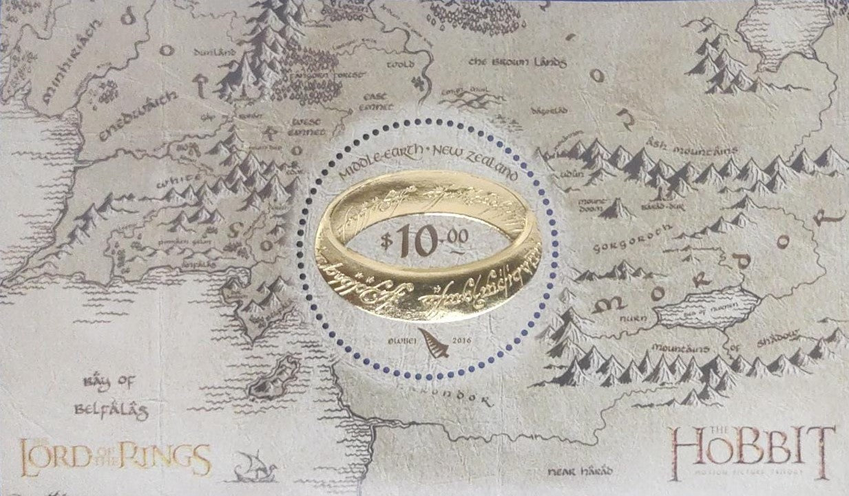 Round shaped high embossed with thick gold foiling ms on Hobbit from New Zealand Issued in 2016. Scarce now