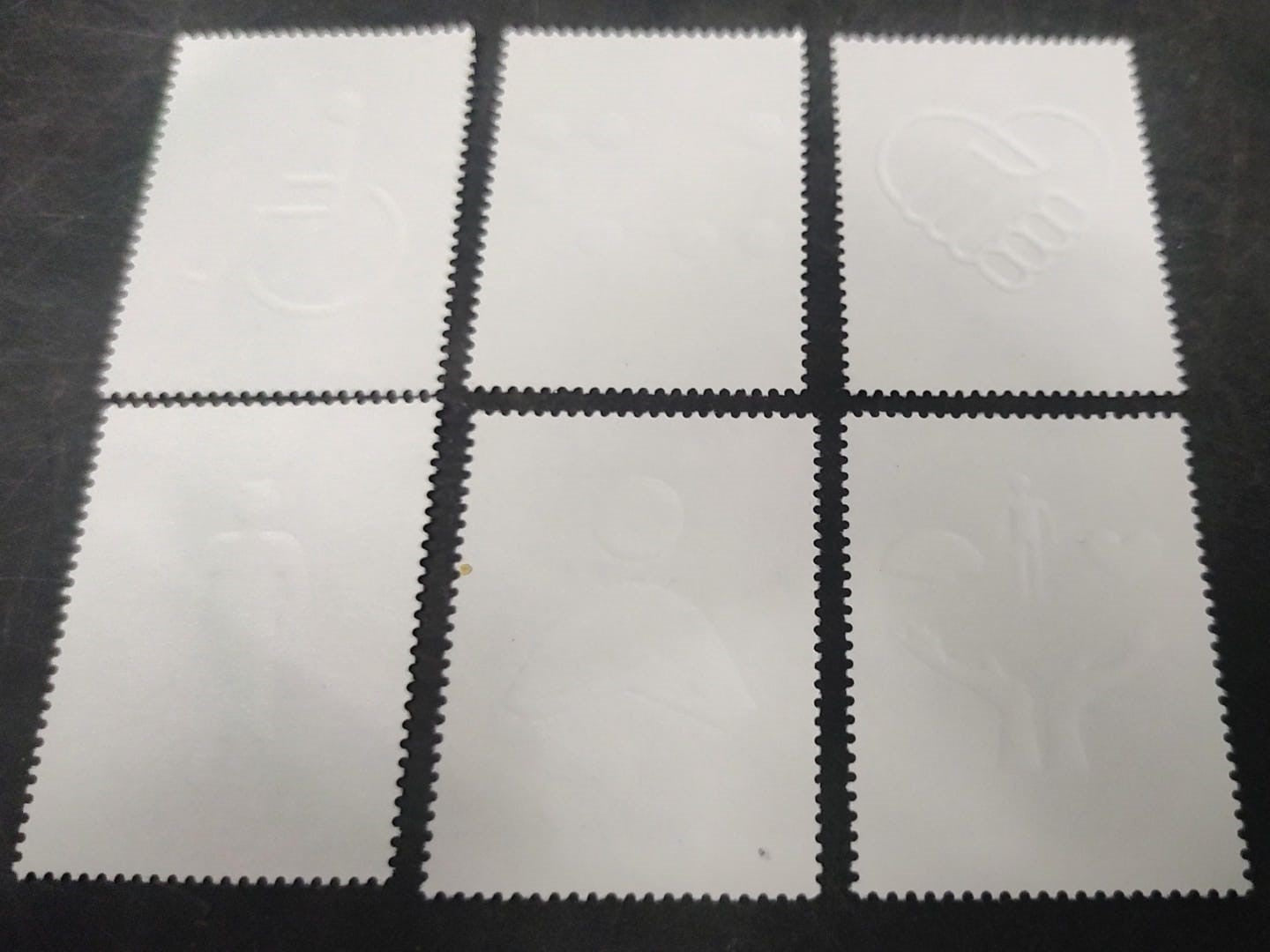 United Nations Braille + embossed stamp complete set from all three offices...All white parts are embossed...