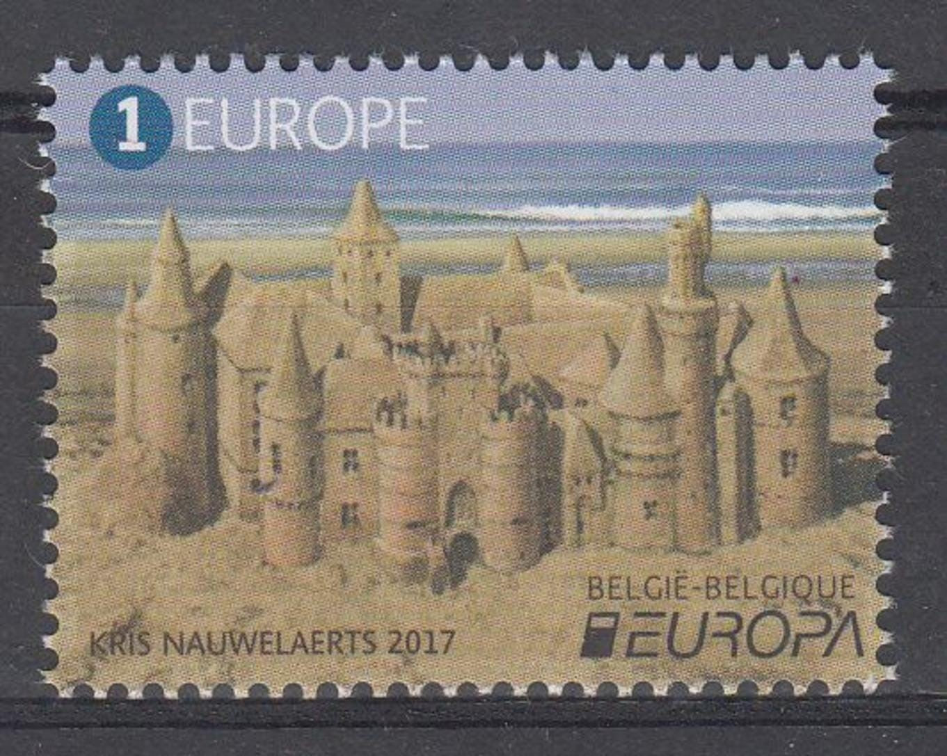 Belgium single stamp with sand affixed. Yellow portion at bottom is full sand.