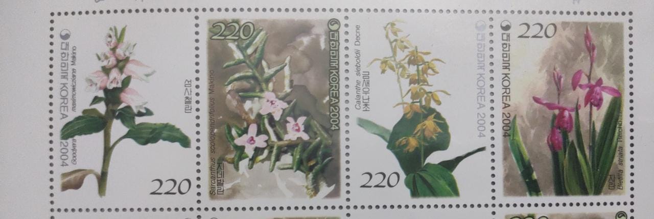 Korea strip of 4 beautiful stamps on orchids with fragrance of orchids Issued in 2004.