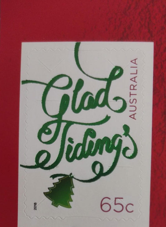 Australia 2018 greetings stamps with red holographic printing on the words glad tidings. Self adhesive