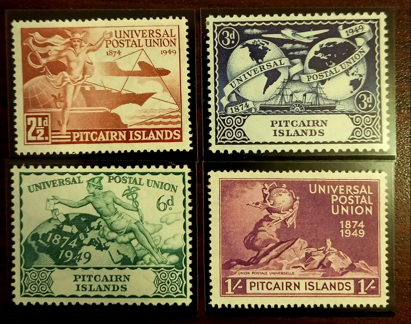 PITCAIRN ISLANDS 1949 UPU SET OF 4 MINT CLASSIC STAMPS WITH MOUNT.