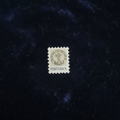 Romania - world's smallest stamp- smaller than your nails.