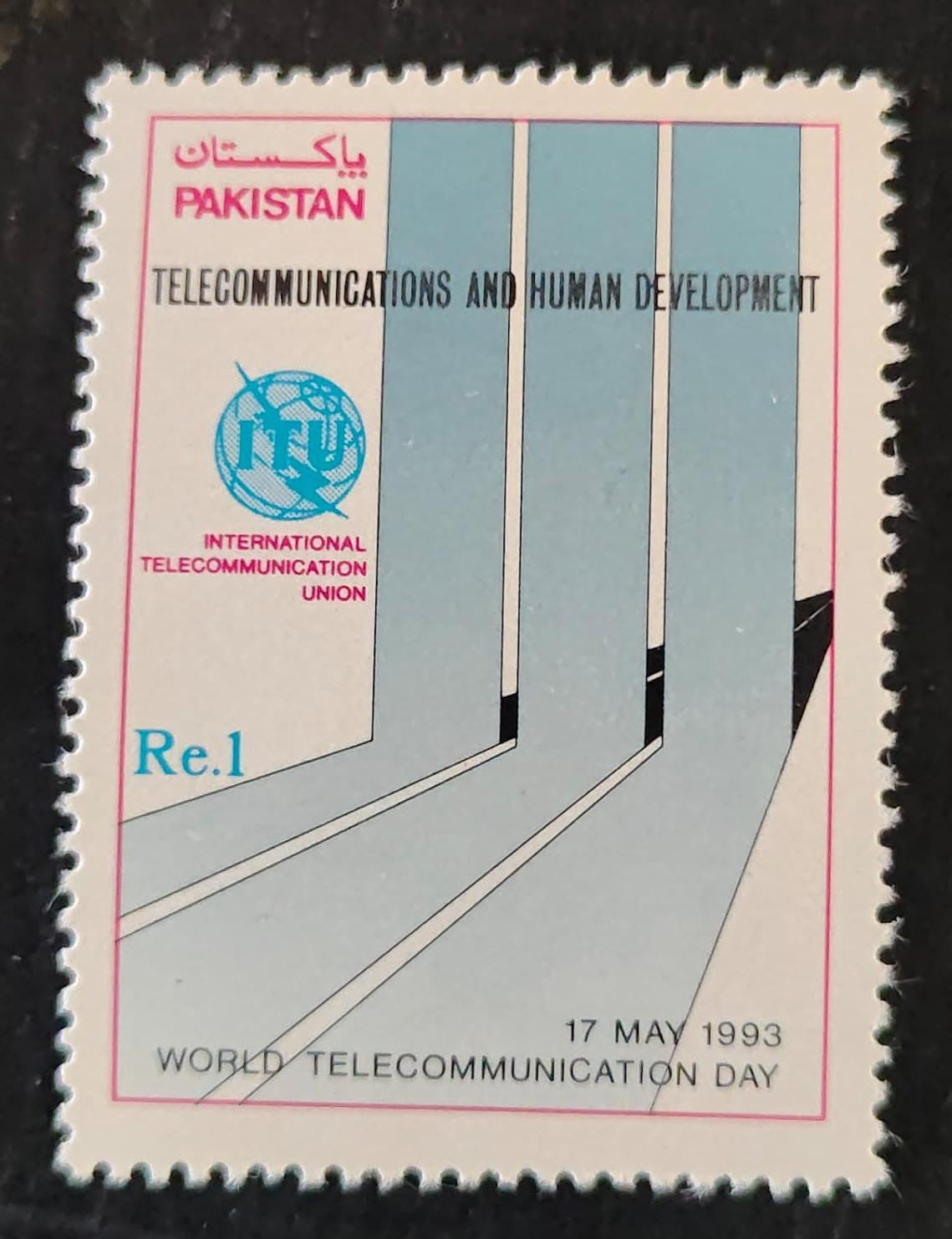 1993 Pakistan World Telecommunication Day stamp, featuring a 1 Re value and the ITU logo.