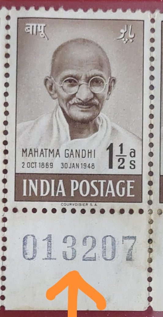 1948 Gandhiji 1½ anna Mint stamp with sheet number at bottom.