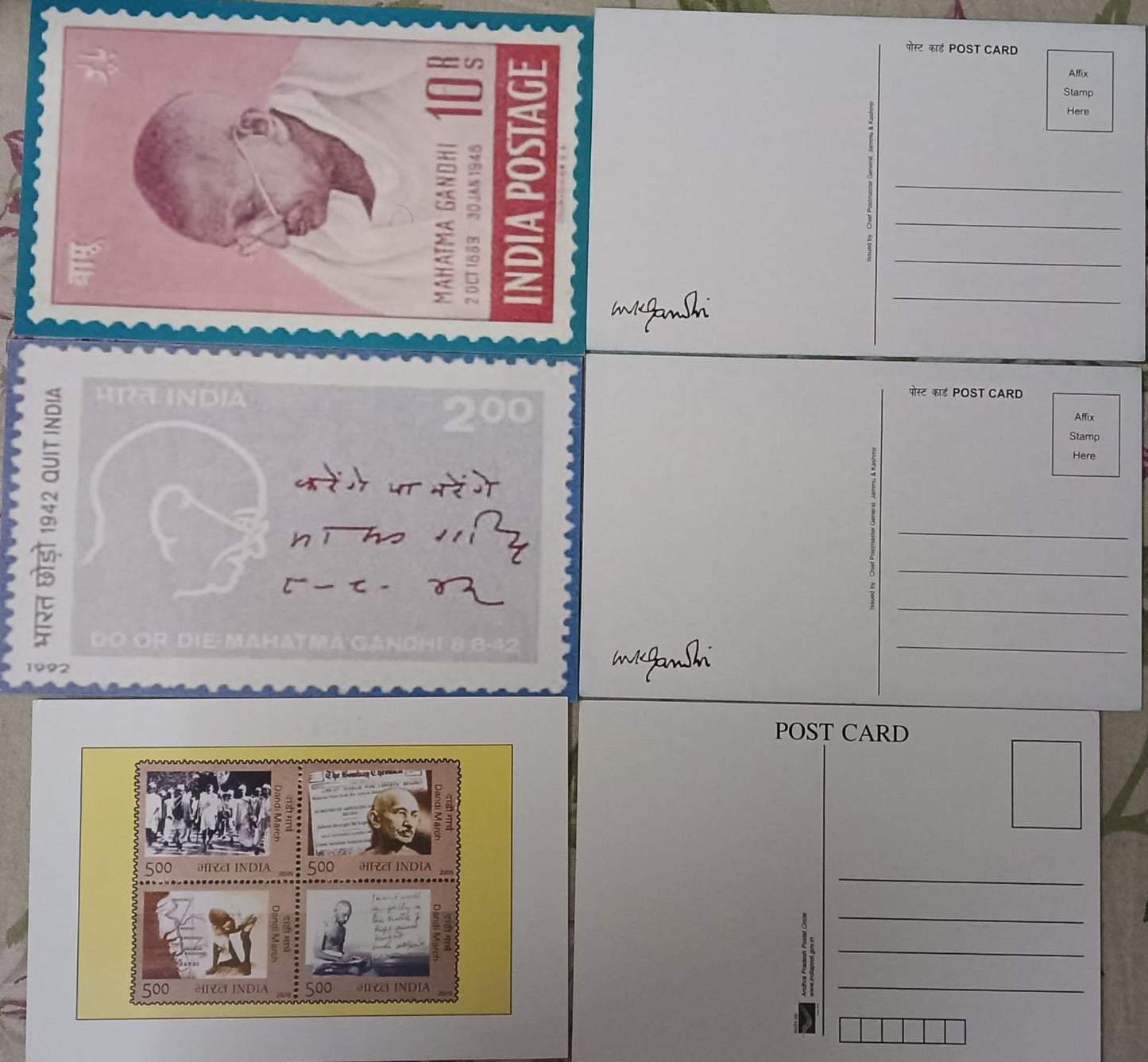 Three mint postcards on Gandhi stamps.