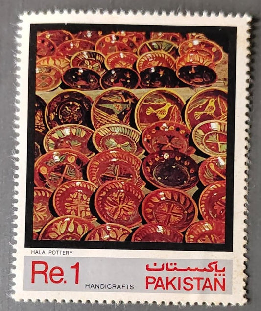 Re  1 Pakistan postage stamp from a 1982 handicrafts set depicting traditional Hala pottery