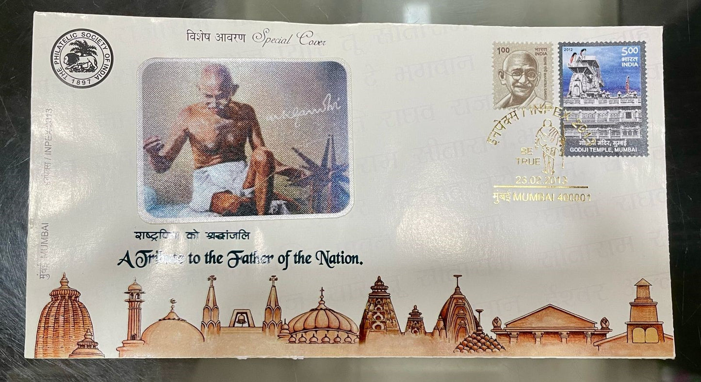 2013 special cover inpex Mumbai with printing and on silk cloth picture of Bapu and with  golden ink cancellation.