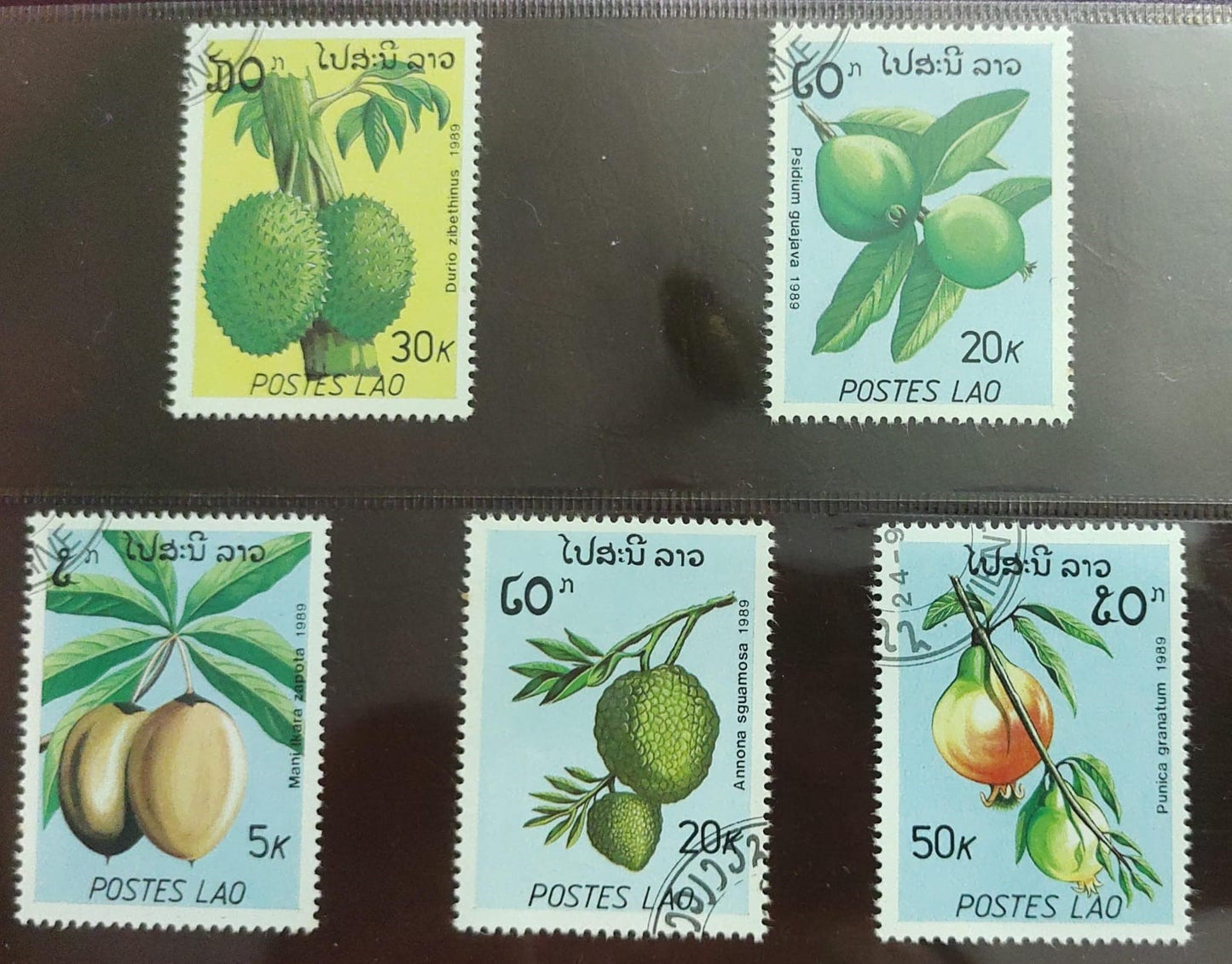 Laos 5 different stamps on fruits .  🍉🍊🍐 Cancelled