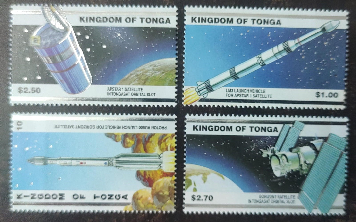 Tonga set of 4 stamps on space - with silver foils.