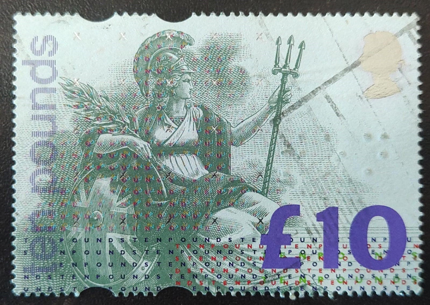 A very very MULTI UNUSUAL stamp from UK-fine used