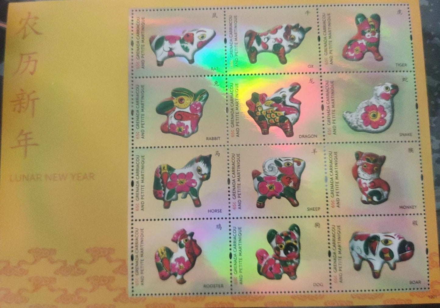 Grenada   Full holographic beautiful sheetlet of 12 different stamps on Zodiac animals signs.