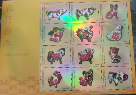Grenada   Full holographic beautiful sheetlet of 12 different stamps on Zodiac animals signs.