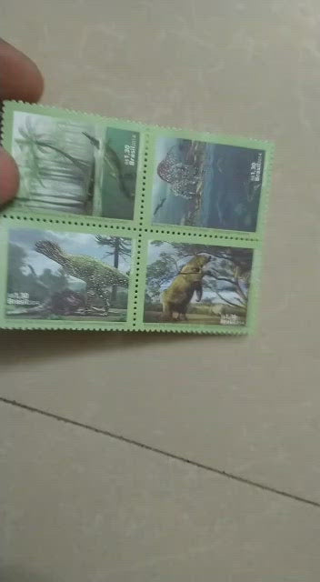 Brazil setenent block of 4 on Dinosaur. With UV gloss - shining surface .
