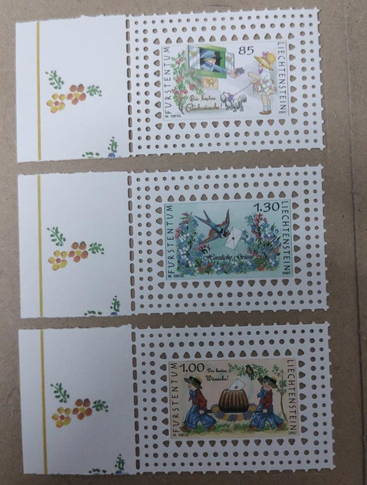 Liechtenstein beautiful set of 3 stamps with holes lazer cut.