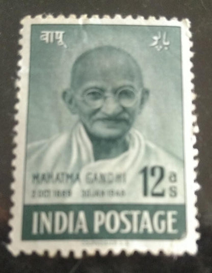 India-12as Gandhi 1948 stamp.  Gum disturbed