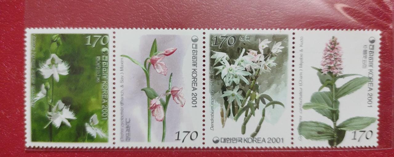 2001 Korea strip of 4 beautiful stamps on orchids with fragrance of orchids.