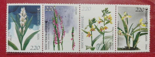 Korea strip of 4 beautiful stamps on orchids with fragrance of orchids.  Issued in 2005