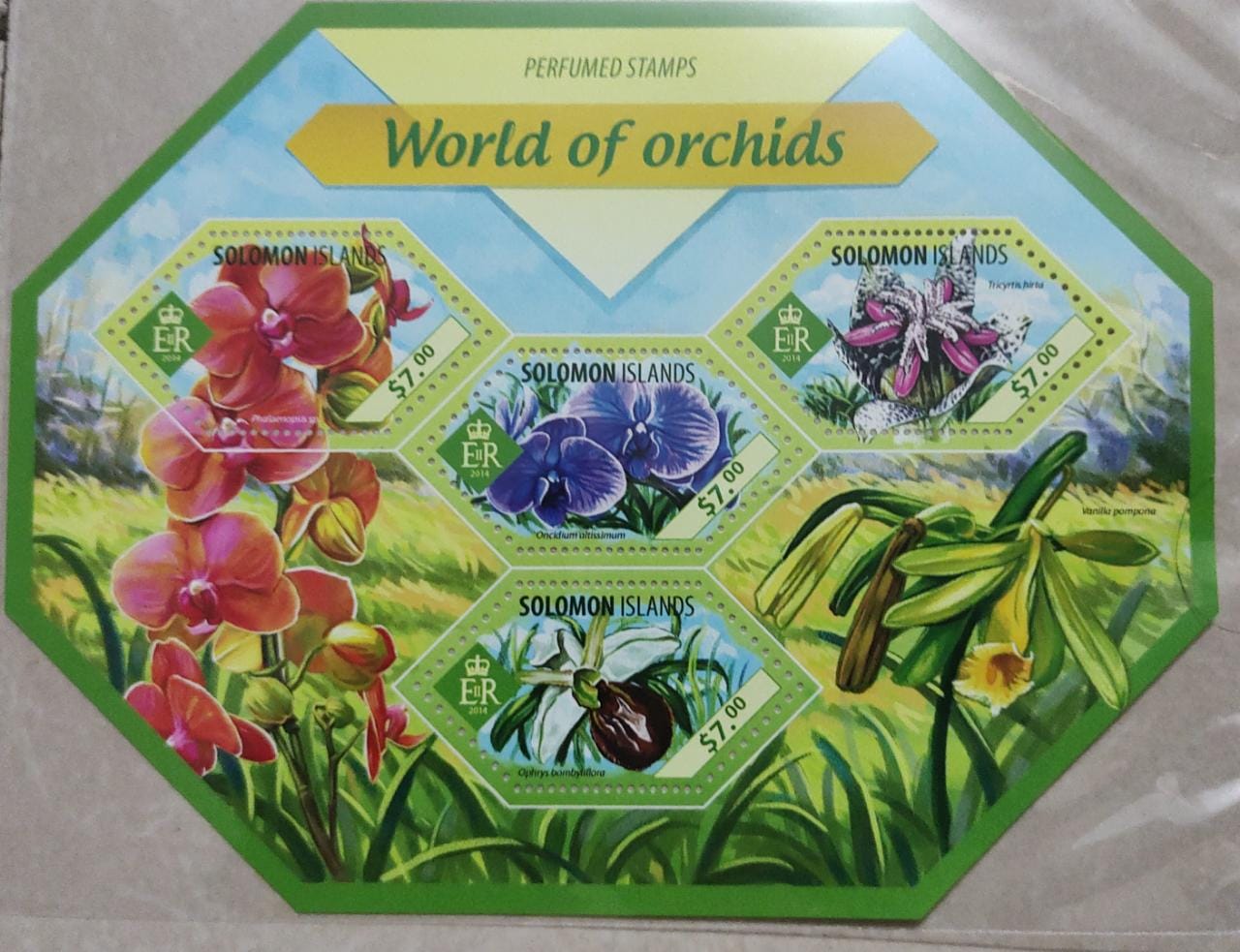 Solomon Islands odd shaped ms with odd shaped stamps with fragrance of orchids.