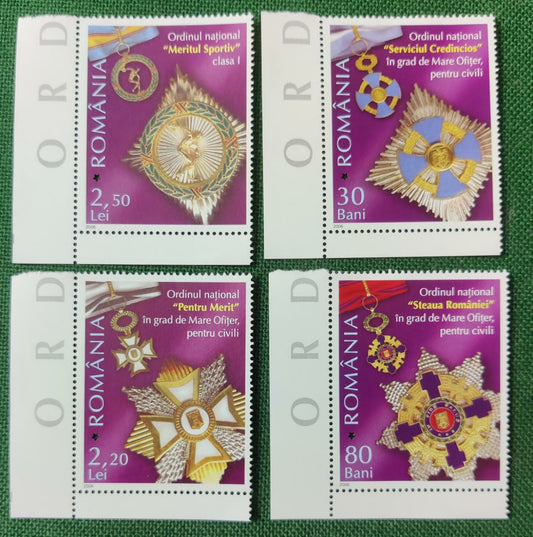 Romania 2006 set of 4 stamps on medals - with * shaped laser cuts in all the stamps.