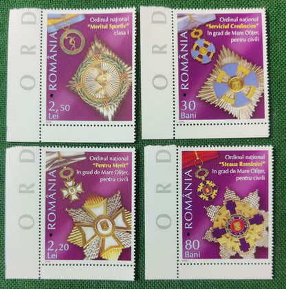Romania 2006 set of 4 stamps on medals - with * shaped laser cuts in all the stamps.