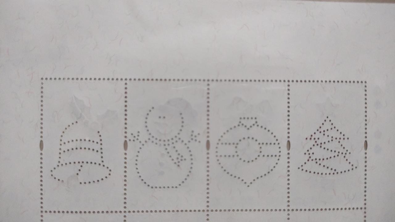 Hong Kong unusual stamps with silver glitters and unusual lazer cut perforations.