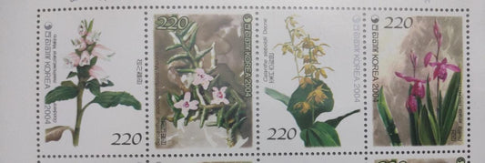 Korea strip of 4 beautiful stamps on orchids with fragrance of orchids  Issued in 2004.
