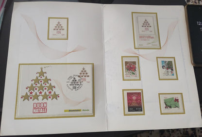 Italy beautiful folder having one FDC and 5 stamps + 1 ms on  Christmas  theme.