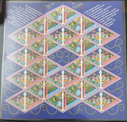Netherlands unique sheetlet on Christmas stamps.   Unique sheetlet with all different laser cuts in 20 stamps.