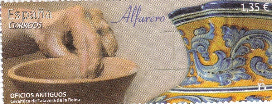 Spain embossed stamp with real pottery clay affixed.