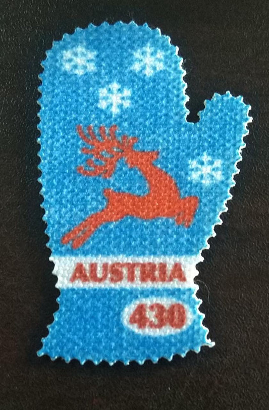ऑस्ट्रिया-दस्ताने के आकार का टिकट विशेष सामग्री से बना है।