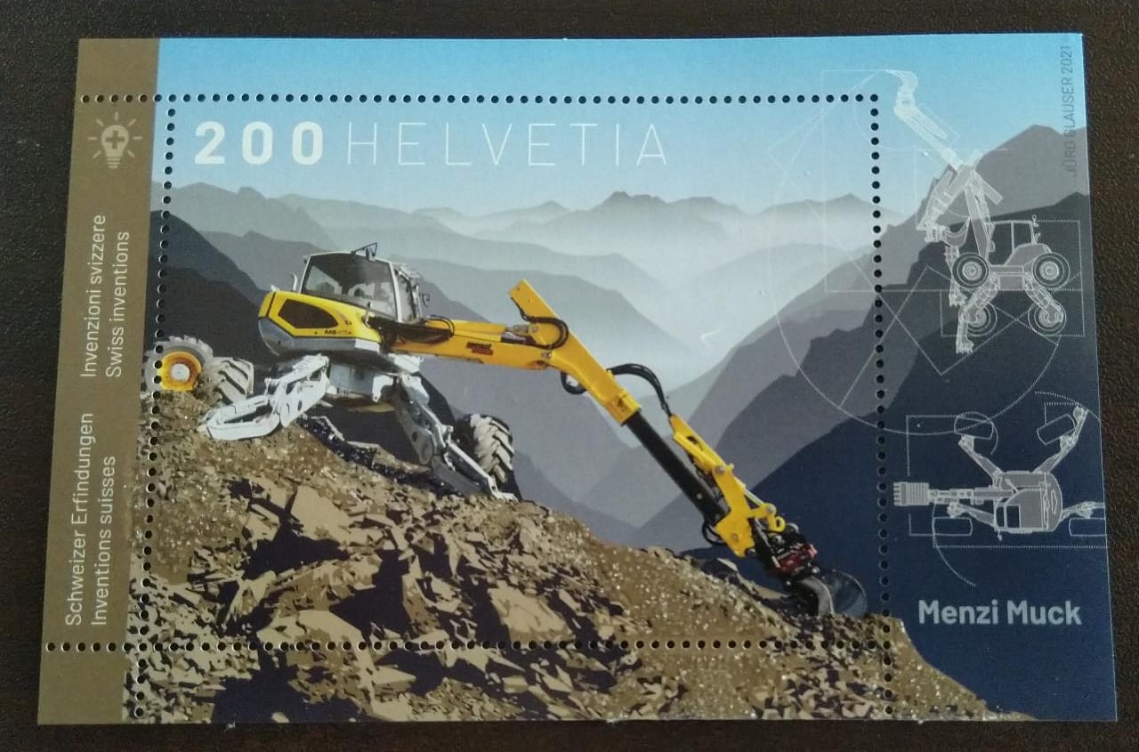 Swiss stamp on earth movers.