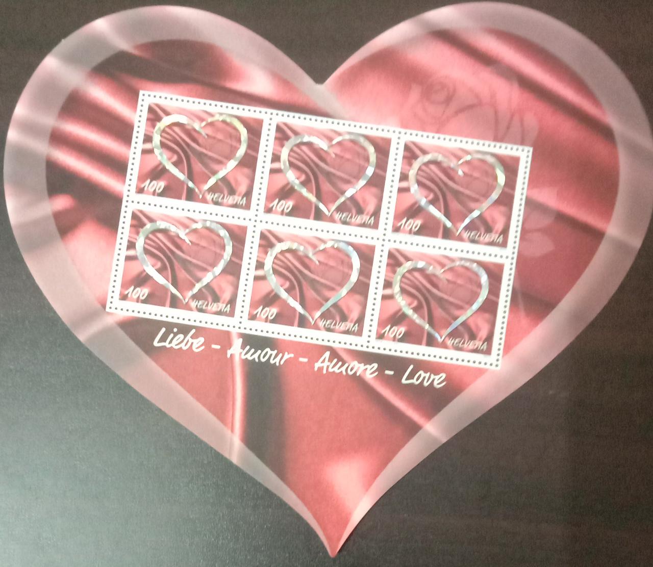 Swiss beautiful heart shaped ms with 6 stamps with holographic effects .