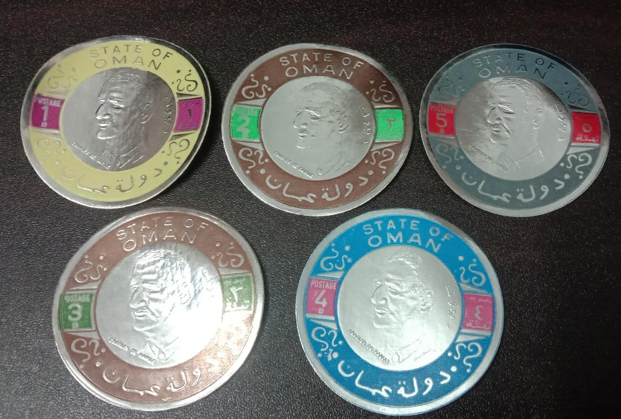 Oman set of 5 different silver coin stamps call are different.