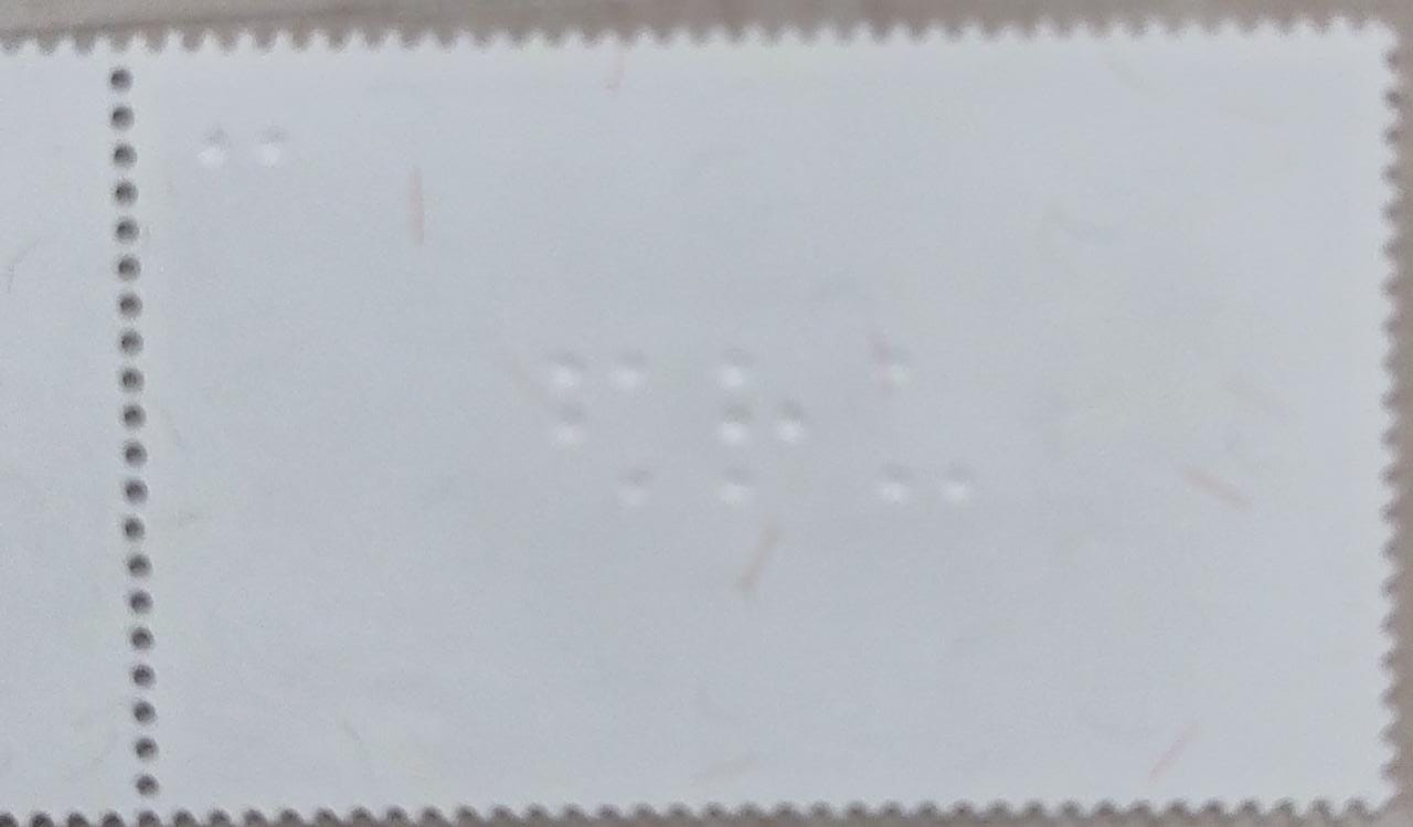 Thailand blind education stamp with Braille writing.